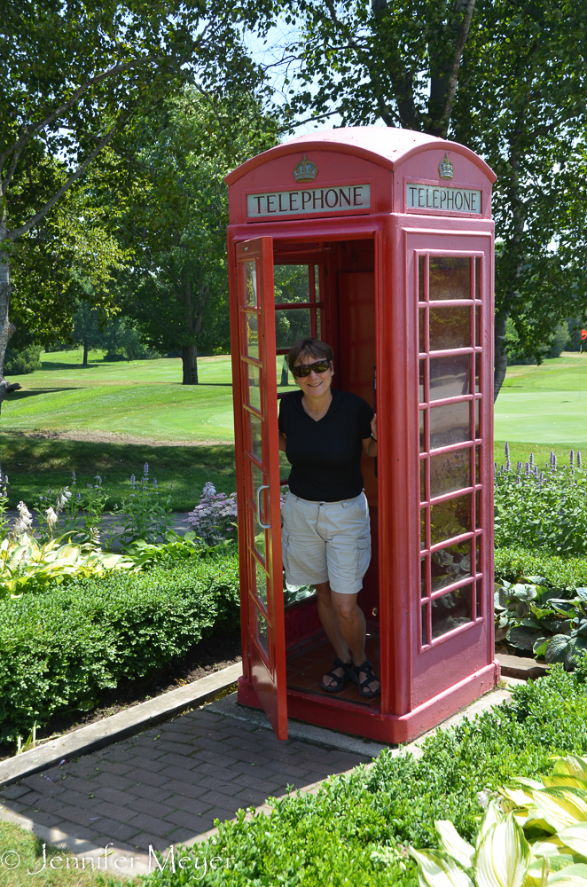 Phone booth on the golf course.