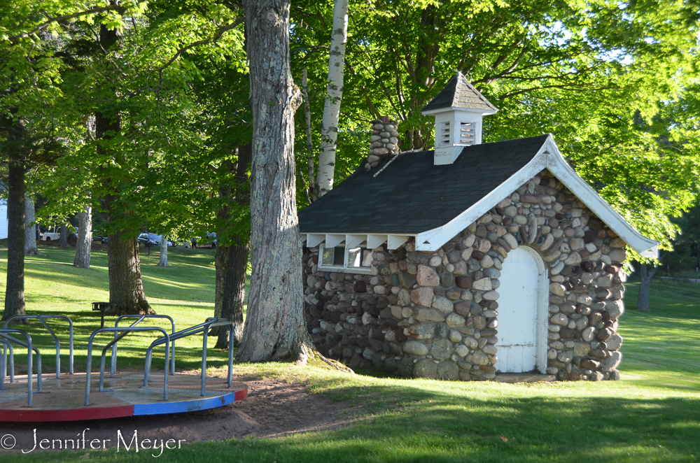 Sweet stone shed and merry-go-round.