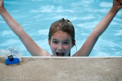 Maddie swam the length of the pool for the first time.