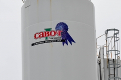 Giant silos are filled with milk.