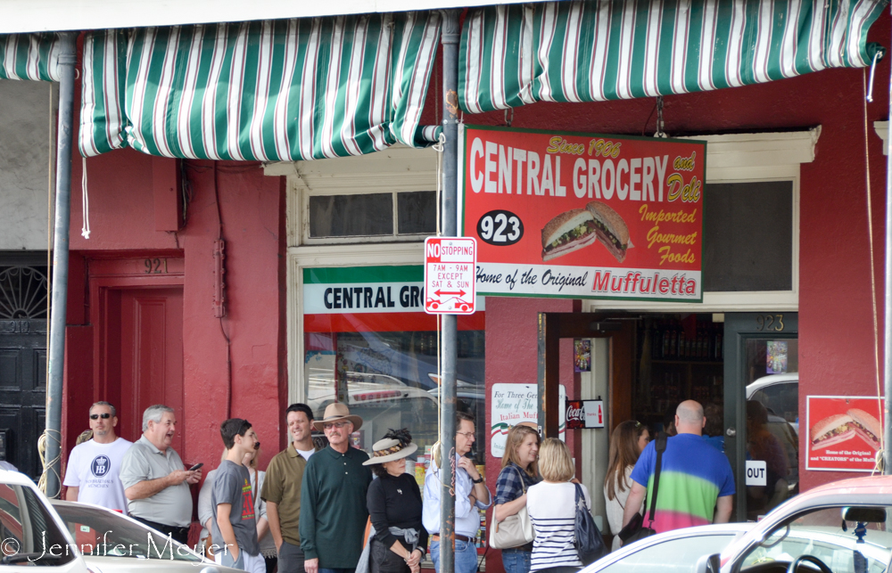 We waited in line at this market for a famed Muffuletta.