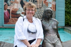 Kate, posing at a fountain.