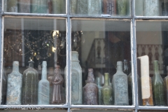 Bottles in a shop window.