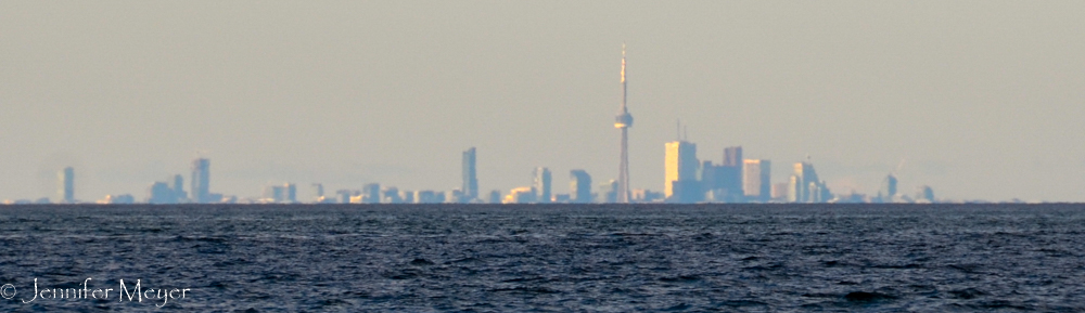 Far across Lake Ontario is Toronto.