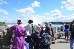 This Amish family had eight kids, all dressed in purple.