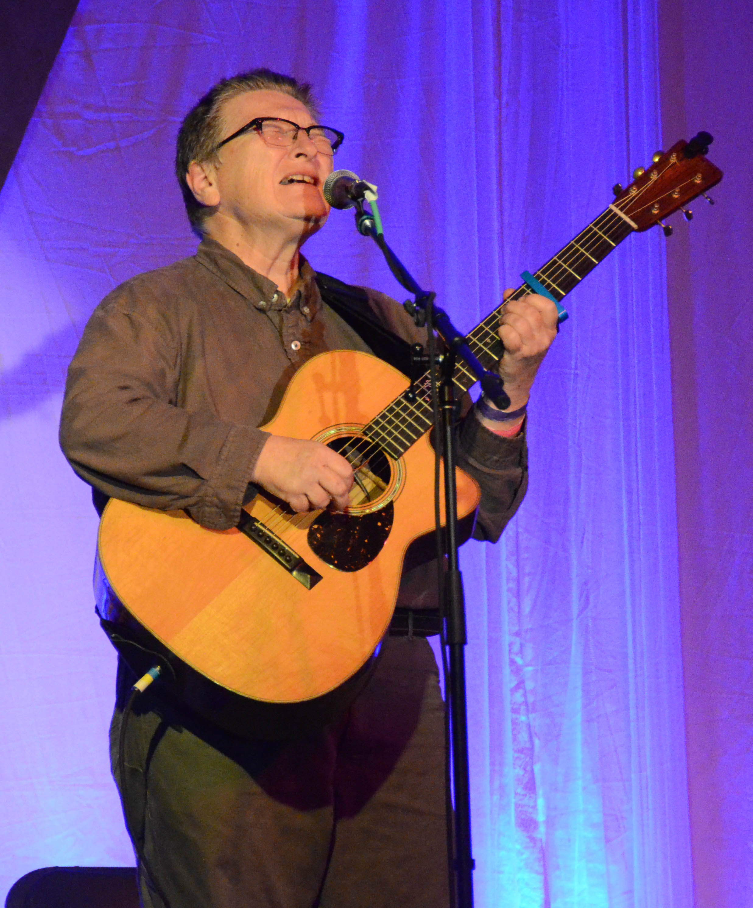 Singing soulfully as ever.