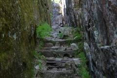 This steep walled walkway was created by an earthquake.