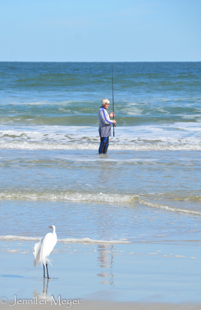 Fisherman and bird.