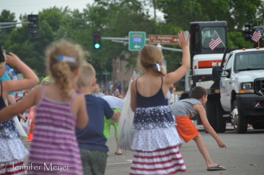 Kids were ready for the tossed candy.