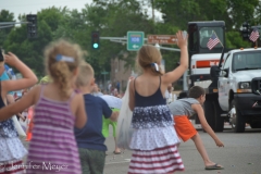 Kids were ready for the tossed candy.