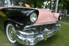 A pink and black Ford.