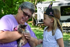 Back at the RV, neighbors meet Gypsy.