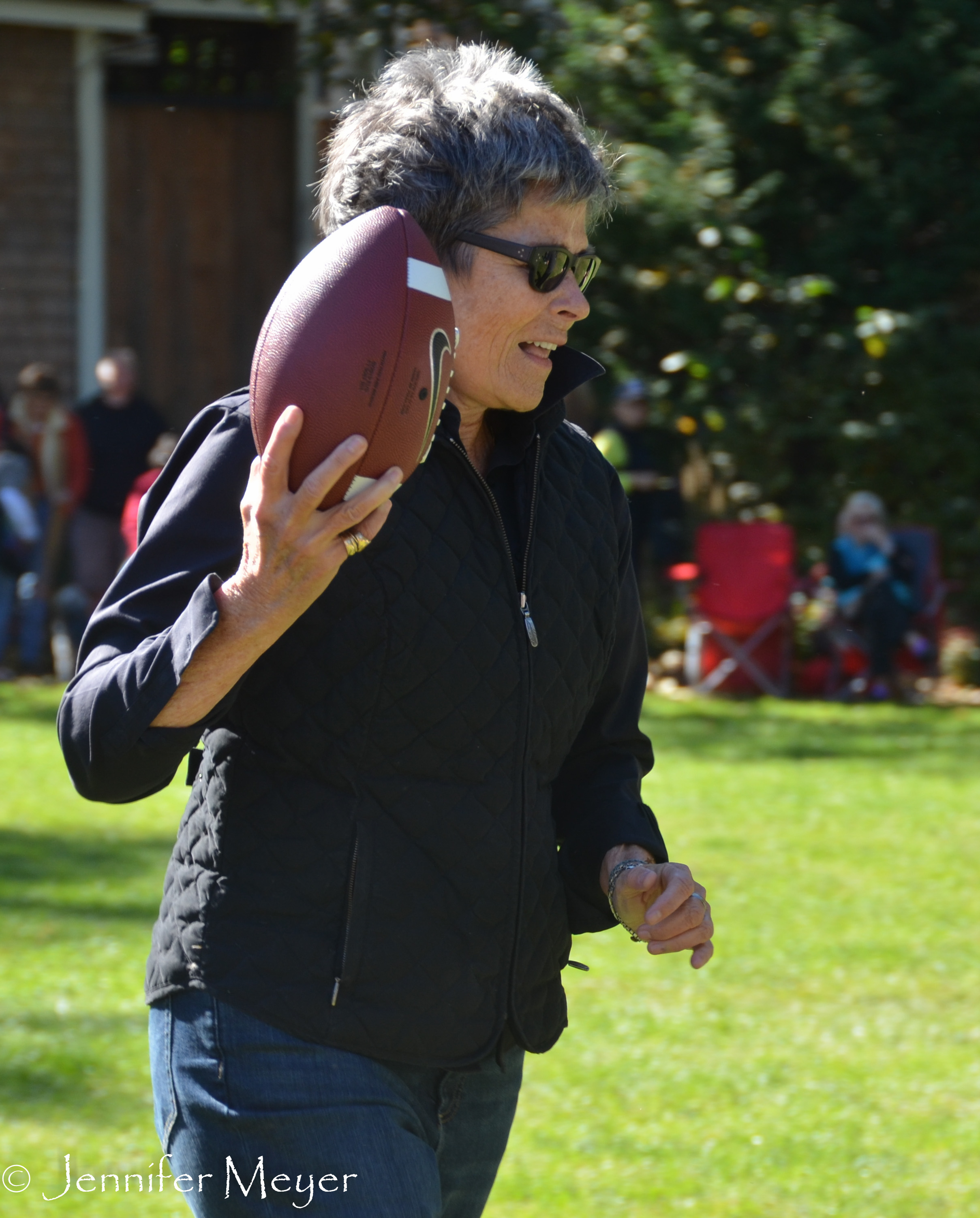 Kate Clinton runs with the ball.