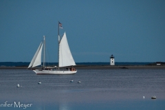 The sunset sail returns to the dock.