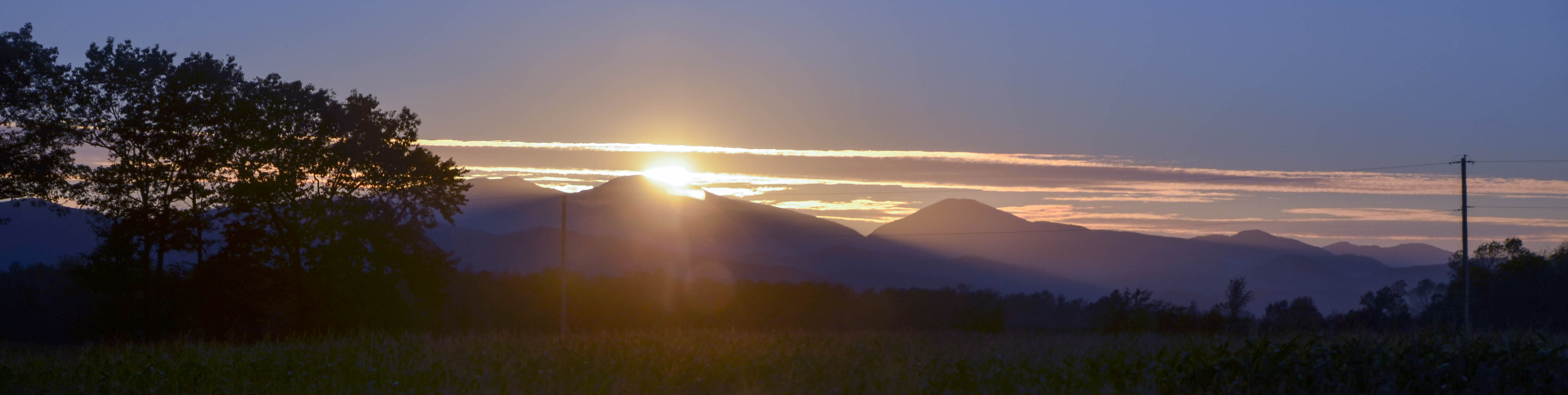 The sun sets into the Adirondack mountains.
