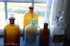 Bottles on a sill.