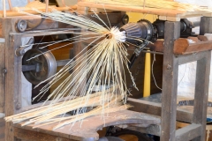 Broom-making machine.