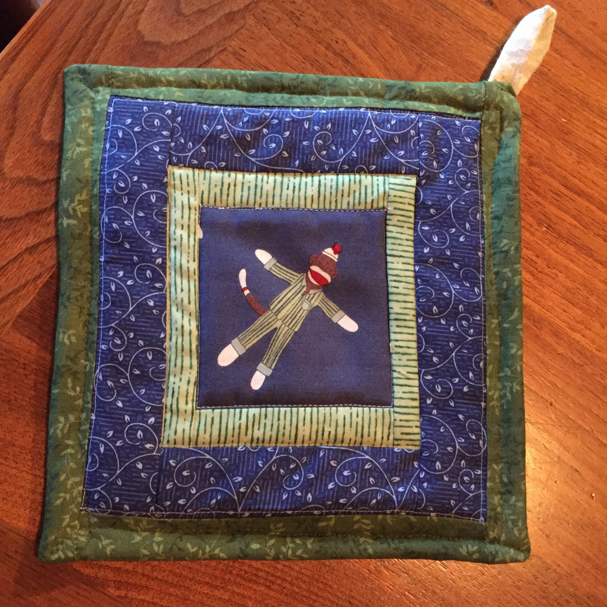 Kate made this potholder for Dad.