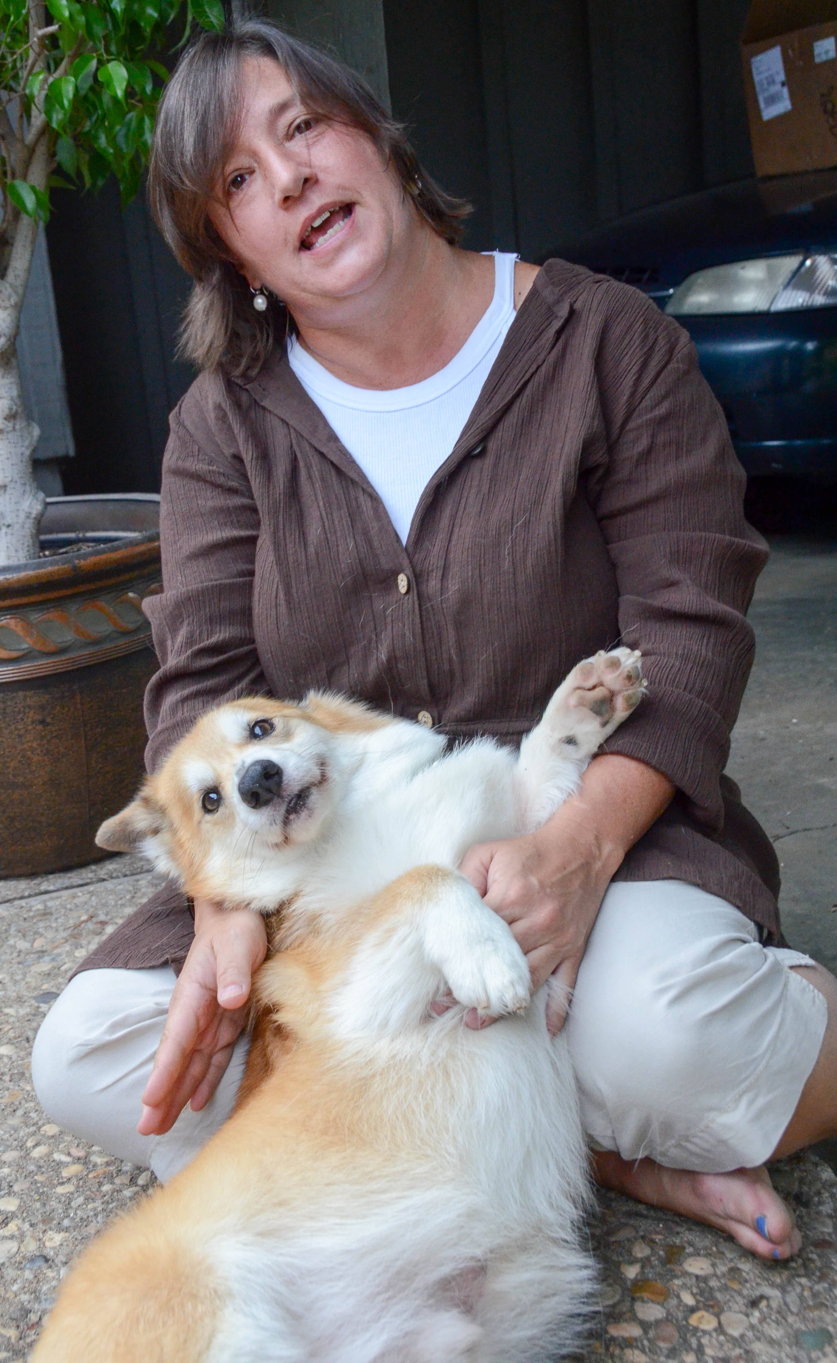 Neighbor Mary Sue and her corgie, Frisco.