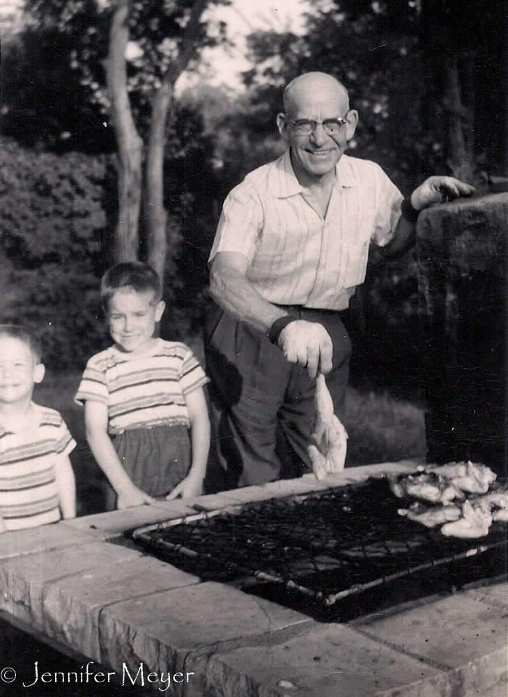 My grandfather built a large BBQ pit in the backyard.