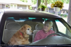 Annie likes to ride in the car with Dad.