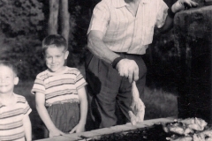 My grandfather built a large BBQ pit in the backyard.