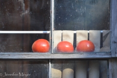 Tomatos on a sill.