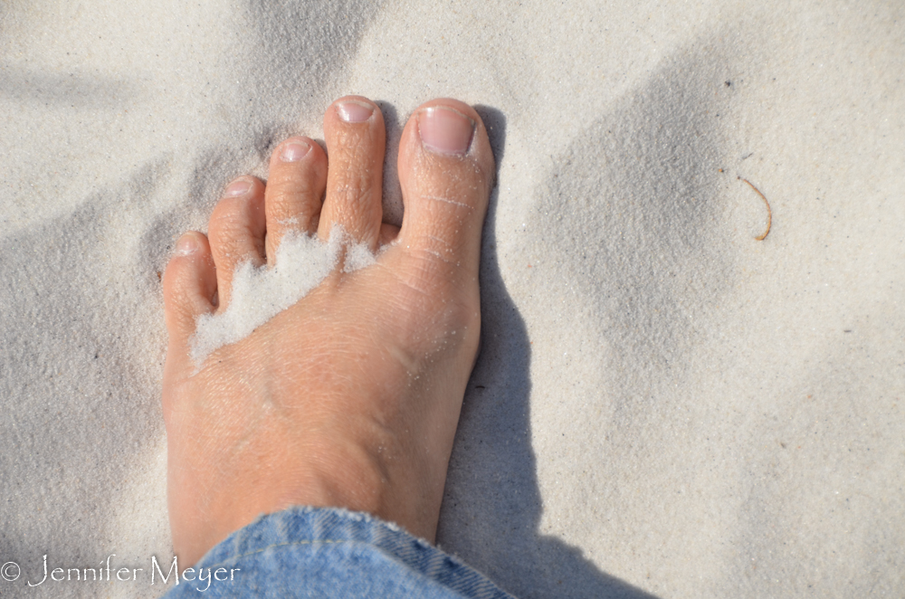 Soft sand warm on my feet.