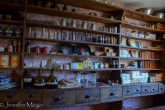 Spices, candlesticks, books, paper, pitcher, slates...