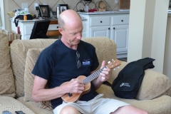 Don loves to play his ukelele.