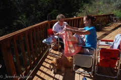 Kate shows Beth the quilt she bought in Fayetteville.