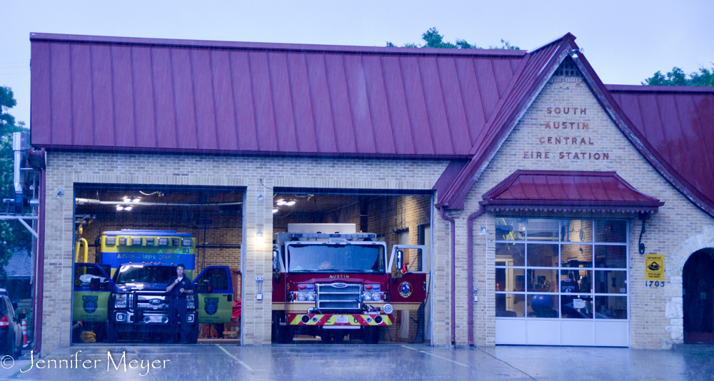 Firefighters across the street were at the ready as thunder crashed.