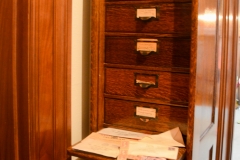 Built-in file cabinet and desk.
