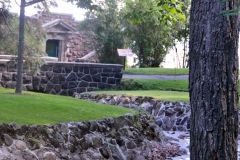 Stone-lined streambed down to the lake.