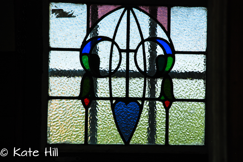 unusual stained glass reminded me of a dream catcher