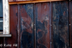 wide tin roof being used for outdoor siding