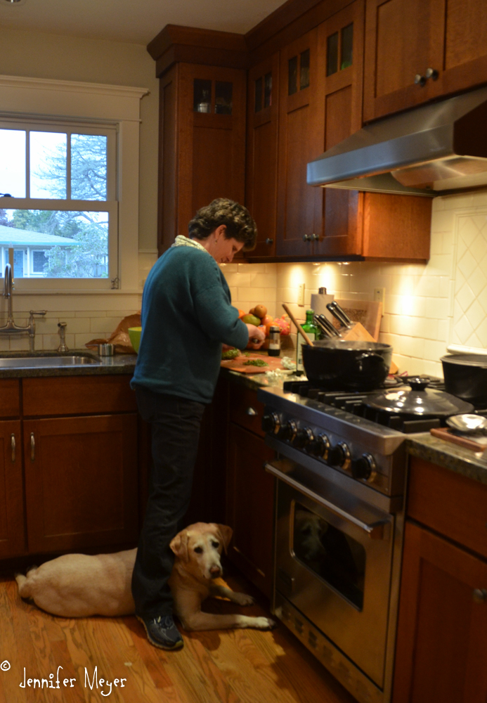 Angelica making pozole with her sous chef, Izzie.