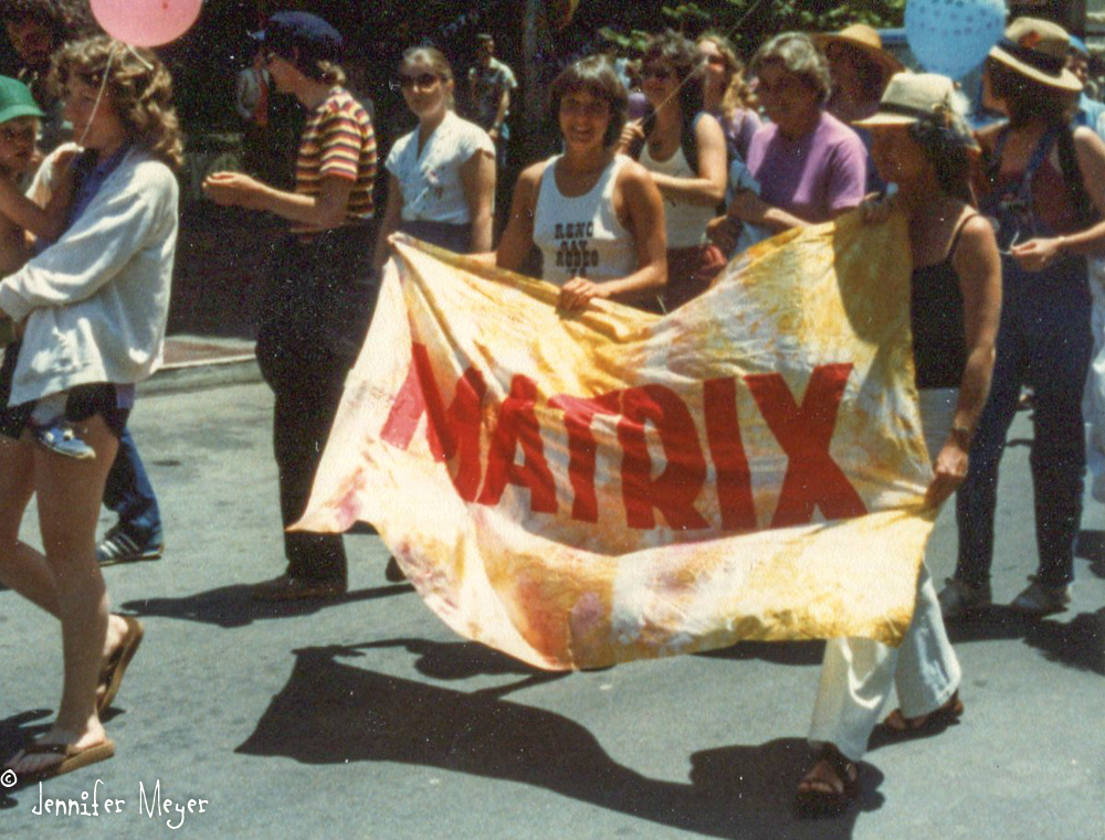 And for fun... a few more historic photos. That's Kate with a friend's son, and me with the Matrix banner in the Pride Parade.