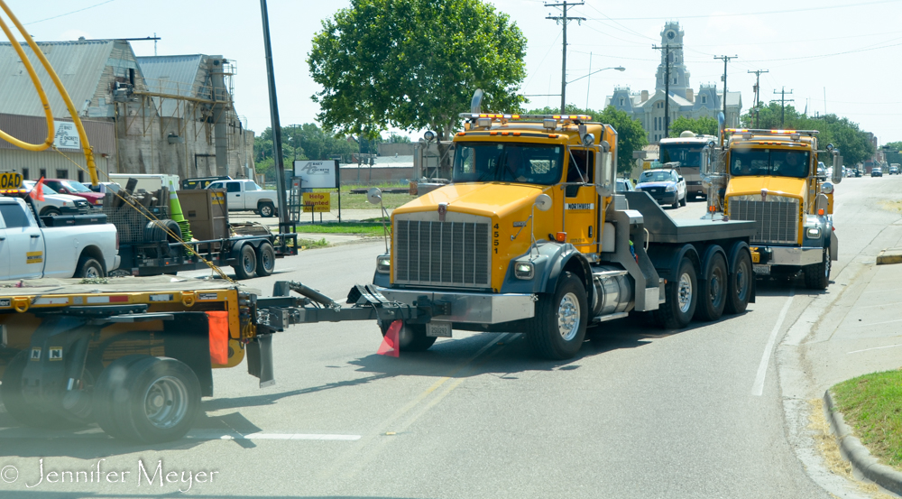 It was pulled by one semi and pushed by two others.