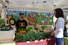 Barbara Ann chats with organic farmer.