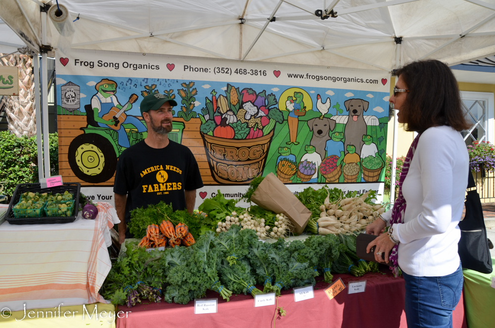 Barbara Ann chats with organic farmer.