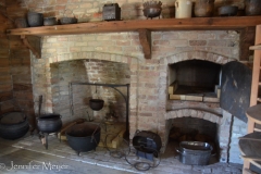 The kitchens were separate from the house to prevent fires and keep the house cooler.