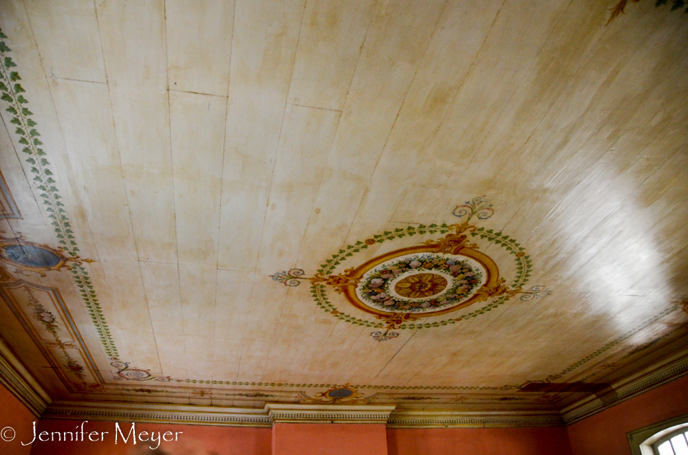 The ceiling and painted walls were carefully restored.