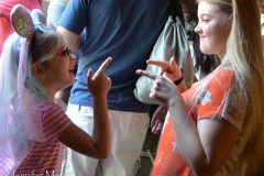 Being silly in line.