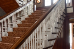 Stairs to the rooms.