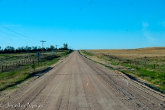 Nine miles of rutted dirt roads.