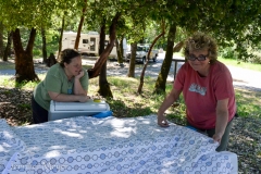 Pinning the comforter cover.