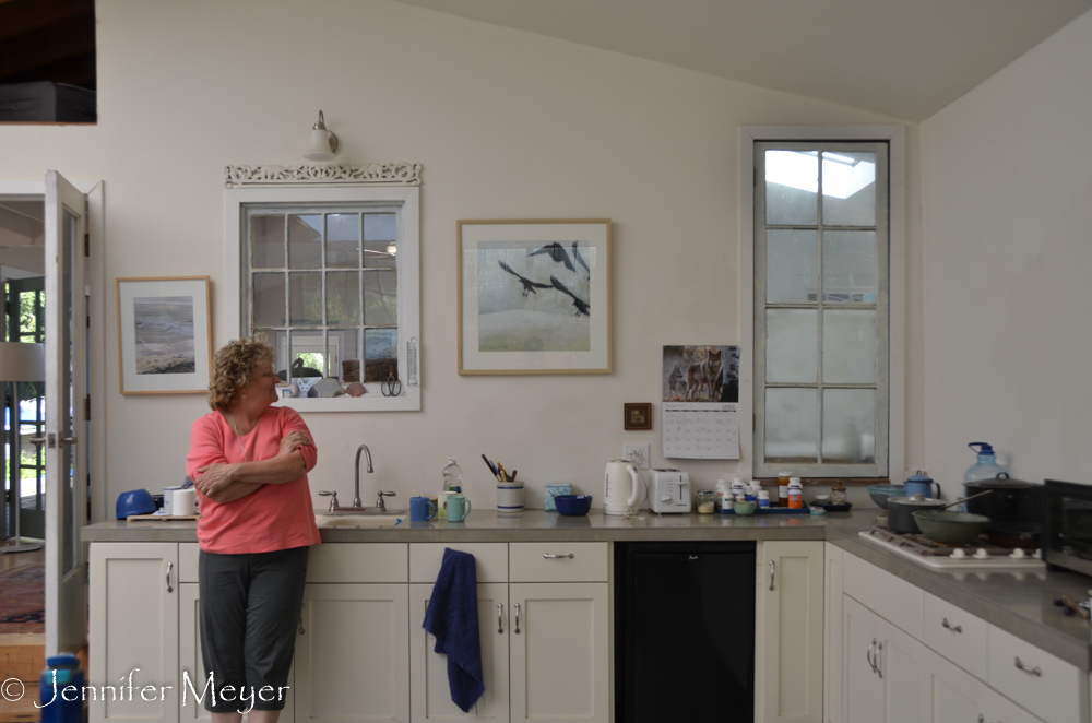 Kate appreciates some of Ray's artwork.