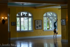 Yoga in a yellow room.