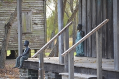 Ghost children on the porch.